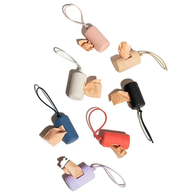 Dispensador portátil de bolsitas para paseos con perros