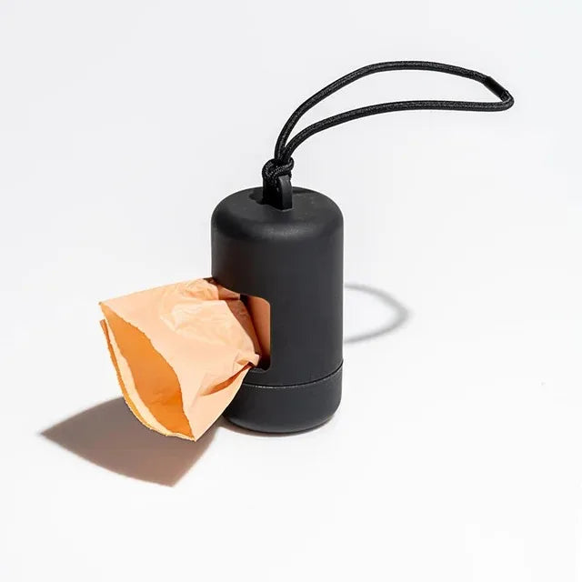 Dispensador portátil de bolsitas para paseos con perros