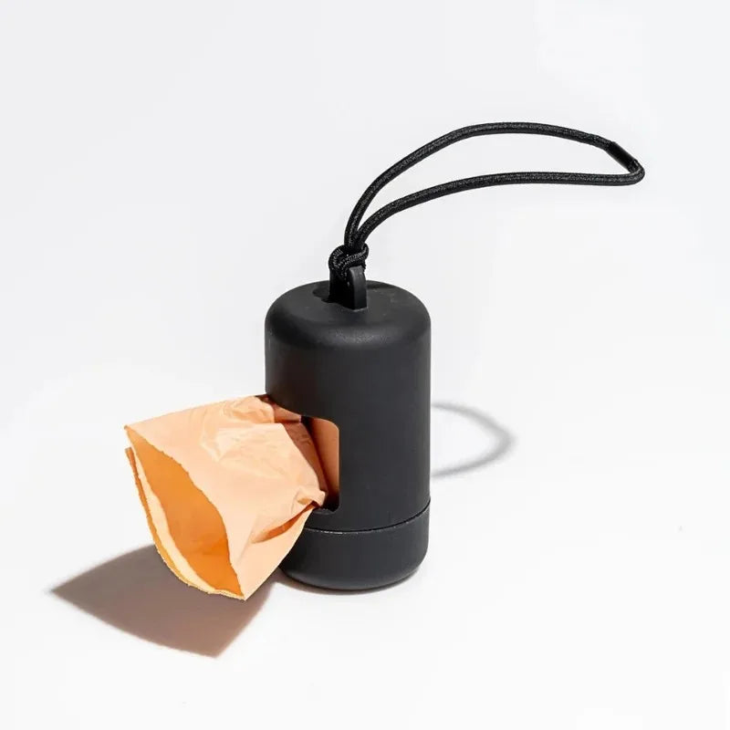 Dispensador portátil de bolsitas para paseos con perros