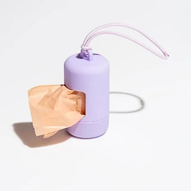Dispensador portátil de bolsitas para paseos con perros