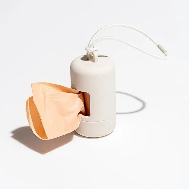 Dispensador portátil de bolsitas para paseos con perros